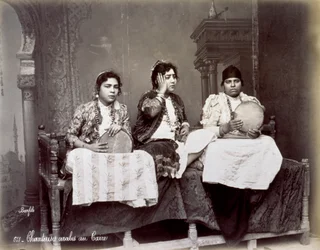 Portrait of Three Young Arab Singers in Ethnic Dress