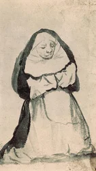 A Kneeling Nun in Prayer
