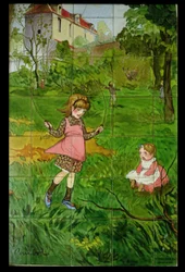 Tiles decorated with children playing in a garden