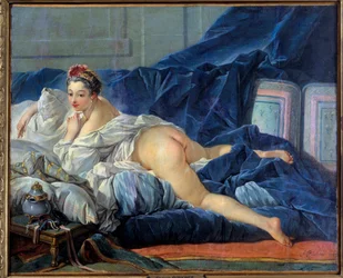The odalisque Young Woman is sitting on a sofa