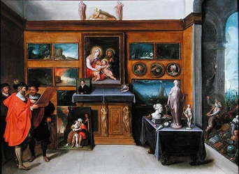 An Interior with a collection of Paintings