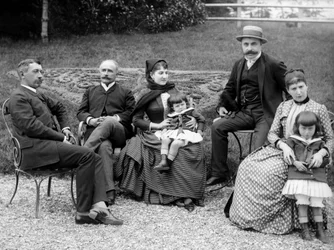 Family of urban dwellers, posing in their garden, near Bourmont in Haute-Marne, circa 1880. Photography. Ducos Collection.