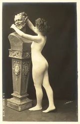 Girl in Body Stocking Paying Attentions to Bust of Satyr