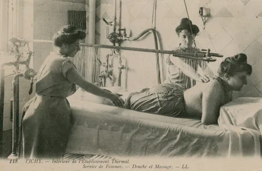 Postcard of a woman receiving a shower and massage at the thermal baths in Vichy, sent in 1913