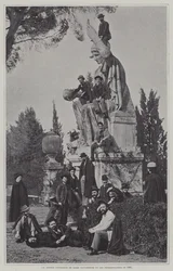 Visitors at the statue of Rome Victorious