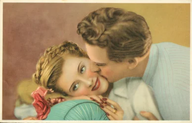 Young Man Kissing a Pretty Girl on the Cheek