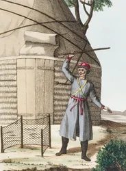 A Kalmuk scaring off evil spirits during his wife