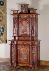 Cabinet with two sections, and a double door representing Actaeon metamorphosising into a deer and the figure of Victory