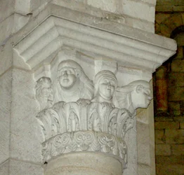 Capital Depicting Three Women
