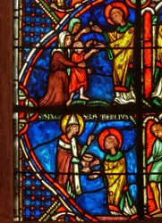 Detail from a window depicting scenes from the life of St. Laurence