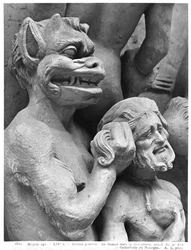 Devil pushing a damned person in the fire, from the Last Judgement of the Cathedral of St. Etienne in Bourges (detail)