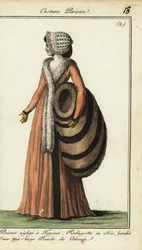 Fashionable woman with huge fur muff