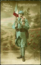 Greeting postcard for the year 1916. A soldier carrying the French flag with a gun and humbling the fragrance of a bouquet of flowers in a country landscape. Colour postcard for the wishes of the year 1916