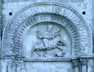 Knight hawking from the facade