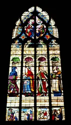 Lancet window depicting four figures in niches