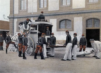Loading the wounded in an ambulance - in Military Album - Crew Train