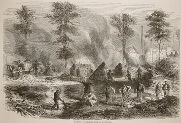 Making charcoal for gunpowder, illustration from Cassells History of the War between France and Germany, 1870-1871