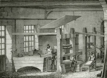 Making paper by hand by sieving pulp in forms. Engraving c1870