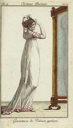 Merveilleuse fixing her hair in front of a mirror