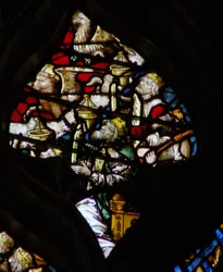 The west rose window depicting a scene from the Book of Revelation: More elders, the bull of St Luke and the eagle of St John