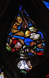 The west rose window depicting a scene from the Book of Revelation: Angel announces the hour of judgment