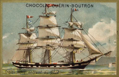 Three-masted sailing ship entering port