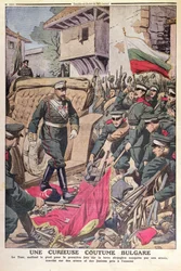Tsar Ferdinand I (1861-1948) of Bulgaria walking over captured flags during the Balkan War of 1912, November 1912