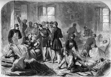 Visit of Emperor Napoleon III to the wounded of the Battle of Montebello in the improvised ambulances in Voghera on 21 May 1859. Engraving from a sketch by Moullin