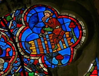 Window depicting the Labours of the Months: October