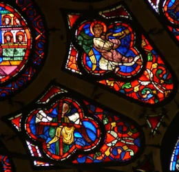 Window depicting an angel with a Passion Instrument - the Cross and an angel with a trumpet at Last Judgement