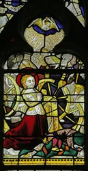 Window depicting St Catherine praying and Angels breaking the wheel by throwing stones