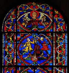 Window w107a depicting an angel and the crucifixion of St Peter