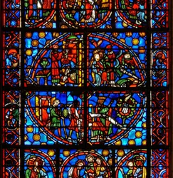 Window w10 depicting typological Old testament scenes: the Spies and the grapes; David and the pelican; two Passover scenes