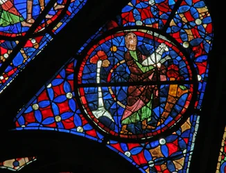 Window w115 depicting Abel brings a lamb to sacrifice