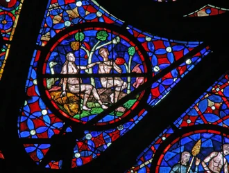 Window w115 depicting Adam and Eve under a tree with animals and birds