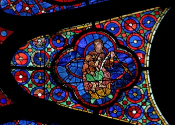 Window w115 depicting Eve feeding her child Seth