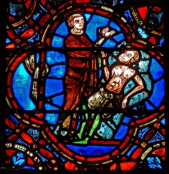 Window w12 depicting a scene in the Good Samaritan window: another traveller sees the wounded pilgrim