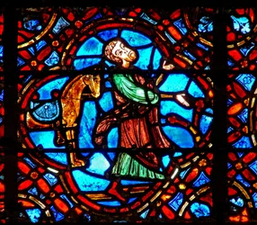 Window w12 depicting a scene in the Good Samaritan window: the Samaritan gets off his horse