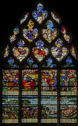 Window depicting the Feeding of the 5000; a local scene of building a bridge