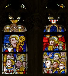 Window depicting St John with a knight and bishop