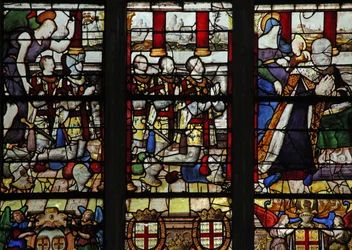Window depicting Anne de Montmorency with his patron saint St Anne (teaching the Virgin to read) and 5 of his sons