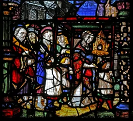 Window depicting the Apostles following a monstrance with the Host