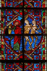Window depicting Adam and Eve expelled from Eden