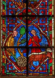 Window depicting labourers