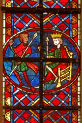 Window depicting a scene from the life of St Vincent: a soldier tells the Emperor Dacien that Vincent has converted the jailer