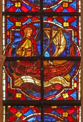 Window depicting St John sails to Patmos