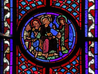 Window w2 depicting a scene from the life of St Mary Magdalene - the saint tells the disciples of the Resurrection