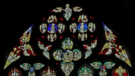 Window depicting musician angels with trumpets at Last Judgement