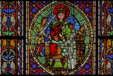 Window depicting Solomon orders the child to be cut in two - the real mother then pleads for the baby