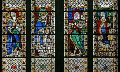 Window depicting St Eloi, St Laurence, St John the Baptist and St Nicholas